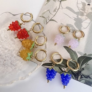 Pastel fruit drop earrings with resin grape and strawberry charms in gold hoops