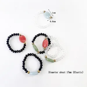 Anelli elastici con perline luminose, gemme ovali colorate e cristalli bianco neri