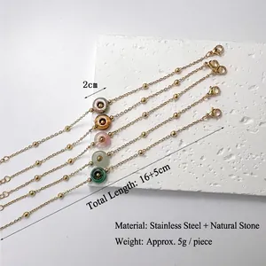 Five gold titanium steel bracelets with colorful natural stone pendants and spacer beads