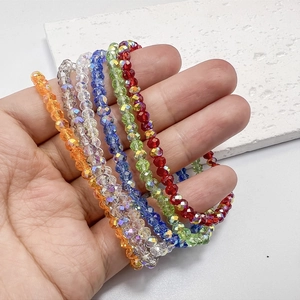 Set of five colorful faceted crystal bead bracelets in vibrant bohemian stacking style