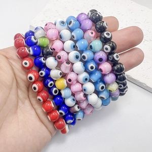Colorful Evil Eye stretch bracelets set with glass beads in multiple vibrant shades