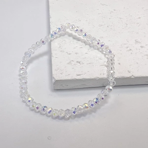 Detail of iridescent AB coated crystal bead bracelet showing rainbow shine on stone base