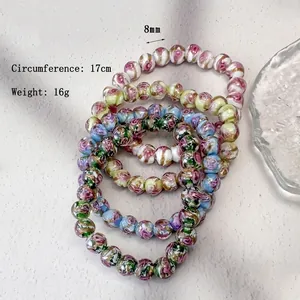 Set de bracelets en perles de verre fleuries 8mm avec détails en feuilles d'or