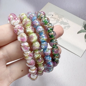Bracelet en perles de verre fait main avec motifs floraux et feuilles d'or style pastoral