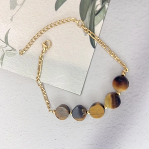 Golden Figaro chain bracelet with tiger eye stone discs and adjustable lobster clasp