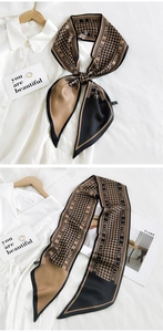 Detail view of double-sided houndstooth twilly scarf used as a decorative necktie