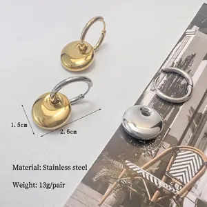 Polished gold and two-tone stainless steel round hoop earrings, 2.6cm width