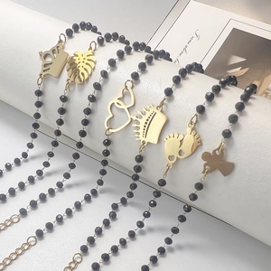 Bohemian black bead bracelet set with gold heart and angel pendants for women