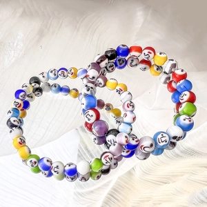 Colorful millefiori glass smiling face beaded elastic bracelets with vibrant colors