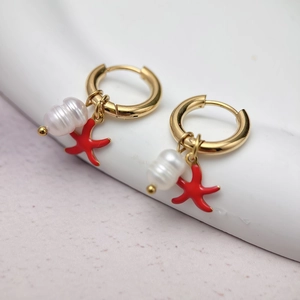 Gold stainless steel hoop earrings with white baroque pearls and red starfish charms