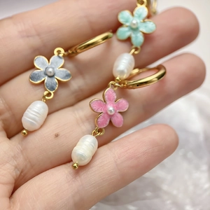 Elegant gold earrings with enamel cherry blossoms and baroque pearls in three colors
