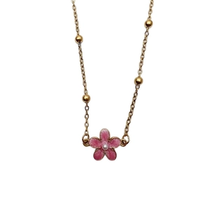 Elegant gold stainless steel necklace featuring a pink flower pendant and small beads