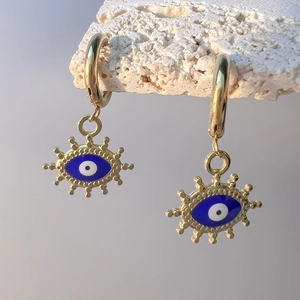 Boucles d'oreilles Œil de Turquie dorées avec émail bleu sur support en pierre