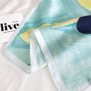 Elegant silk-feel square scarf featuring artistic oil painting print in blue and yellow