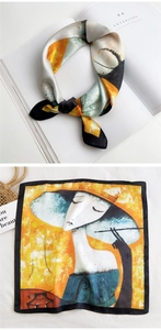 Detailed view of square silk scarf with yellow and black artistic portrait print