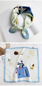 Detail of mint green square silk scarf with academic math illustrations and blue edges