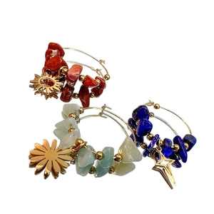 French retro gold-plated titanium steel earrings with natural stone chips and sun charms
