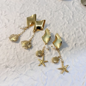 Golden sea-themed stainless steel earrings with starfish, shell pendants and pearls