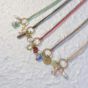 Handmade braided rope necklaces with colorful natural stones and gold eye pendants