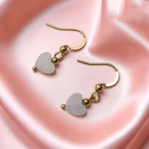 Pink heart-shaped natural stone earrings with gold stainless steel hooks on silk