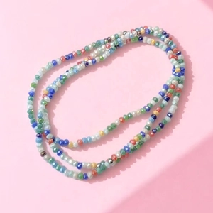 Colorful bohemian style multi-layer beaded anklet with vibrant glass seed beads