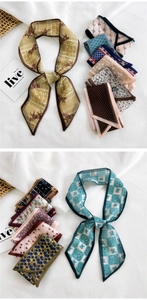 Detail of assorted patterned silk twilly scarves for neck, hair, or bag decoration