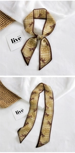 Detailed view of ginger yellow silk twilly scarf with horse print tied as a bow