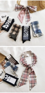 Detail of assorted fashion skinny silk scarves with various patterns on a designer bag