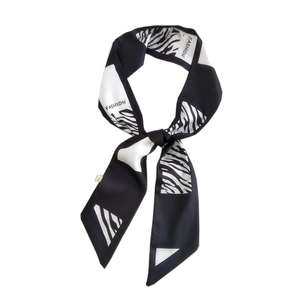 Fashionable zebra print skinny scarf in black and white with a stylish knot display