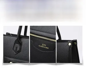 Detailansicht der schwarzen Leder-Einkaufstasche mit Goldlogo und feinen Nähten