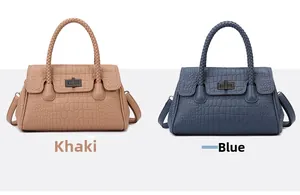 Close-up of crocodile pattern texture and metal turn-lock closure on khaki and blue bags