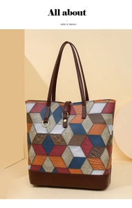 Detail of 3D geometric patchwork tote with mixed textures like crocodile and lychee leather