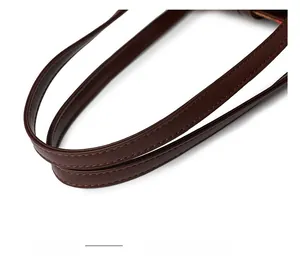 Close-up of durable brown leather handle with reinforced double stitching and oil edges