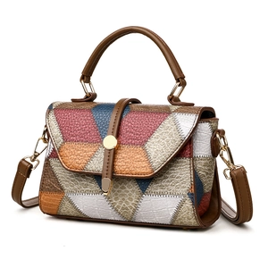 Fashionable color-block small square bag with litchi texture and gold hardware