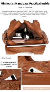 Detail of the multi-layer storage and rear zipper pocket of the brown leather handbag
