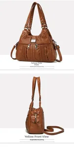 Close-up of yellow soft leather crossbody bag featuring multiple zippers and woven texture