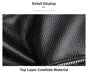 Close-up of premium black top grain leather texture and durable metal zipper detail