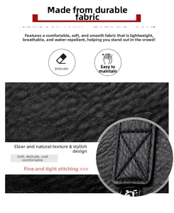 Detail of waterproof black pebble grain fabric with reinforced stitching on tote bag