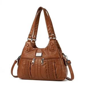 Brown soft leather shoulder bag with vintage texture and woven details for women
