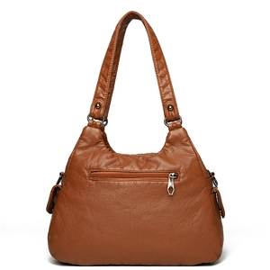 Classic brown soft leather shoulder bag with side pockets and a back zipper pocket