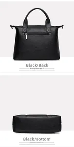 Close-up of black tote bag showing back zipper pocket and sturdy base structure