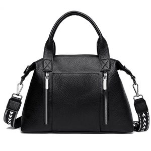 Large black vintage leather tote bag with dual metal zippers and wide geometric strap