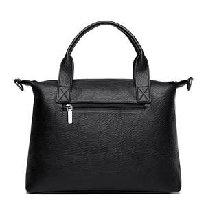 Large capacity black tote bag with lychee texture and back zipper pocket in white background