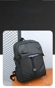 Detail of multi-functional black business backpack with buckle closure and side mesh pocket