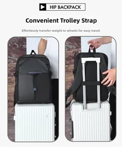 Detail of black nylon business backpack with convenient luggage strap for travel