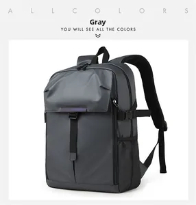 Detail of water-resistant matte fabric and breathable mesh pocket on grey business backpack