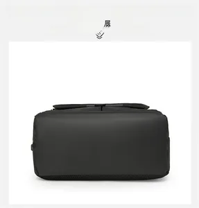 Detail view of the backpack bottom featuring reinforced black honeycomb mesh fabric