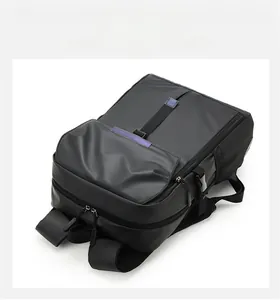 Top view of waterproof business backpack featuring multi-layer zipper compartments and straps