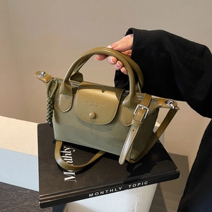 Deep green nylon and leather flap handbag with adjustable shoulder strap for women