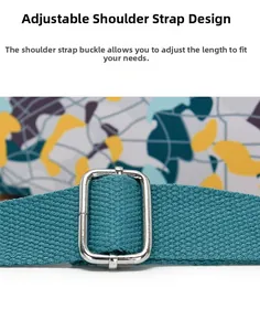 Close-up of adjustable teal woven shoulder strap with polished silver metal buckle
